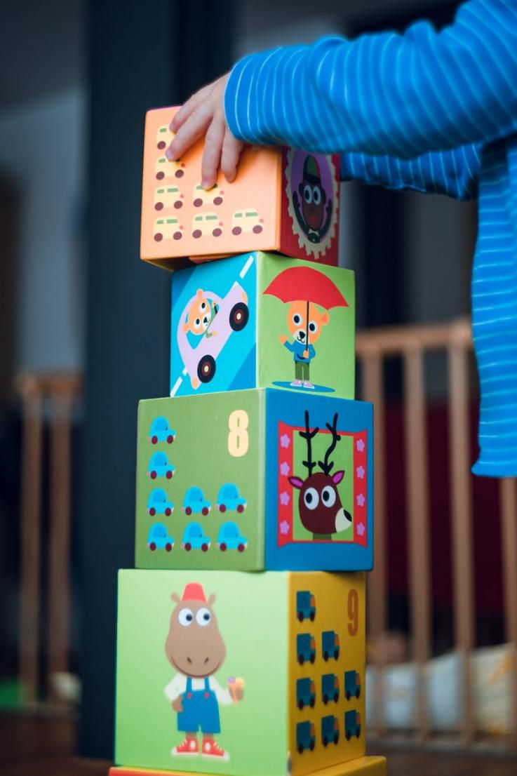 Design for Kids & Toys Child Playing (Photo by Markus Spiske on Unsplash)